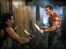 Arnold Schwarzenegger in the movie "Commando" as John Matrix