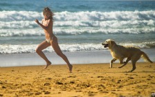 Babe with a Dog on the Beach