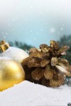 Gold Christmas Baubles with a Pine Branch