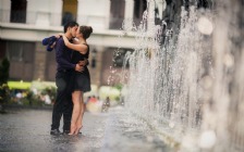 Love Couple kissing near Fountain