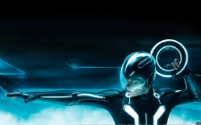 Tron: Legacy Garrett Hedlund as Sam Flynn with a Disc